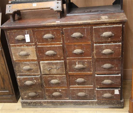 A chest of twenty drawers W.108cm